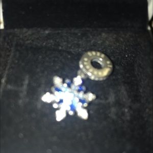 Pandora snowflake dangling charm.